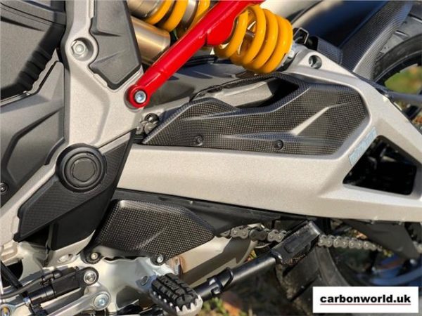 https://shared1.ad-lister.co.uk/UserImages/dccdce45-84a2-4984-a788-dd7d038e16de/Img/multistrada_v4/carbonworld-front-chain-guard-for-multistrada-v4-ducati-fitted.jpg