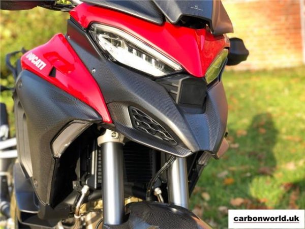 https://shared1.ad-lister.co.uk/UserImages/dccdce45-84a2-4984-a788-dd7d038e16de/Img/multistrada_v4/ducati-multistrada-carbon-nose-fairing-set-fitted-v4.jpg