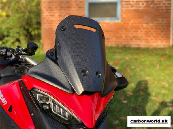 https://shared1.ad-lister.co.uk/UserImages/dccdce45-84a2-4984-a788-dd7d038e16de/Img/multistrada_v4_carbonworld/fitted-carbon-screen-to-ducati-multistrada-v4.jpg