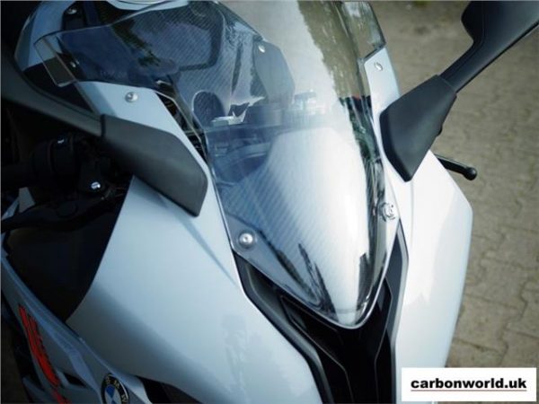 https://shared1.ad-lister.co.uk/UserImages/dccdce45-84a2-4984-a788-dd7d038e16de/Img/carbonworld_bmw/s1000rr-2019-carbon-cockpit-cover-in-twill-gloss.jpg